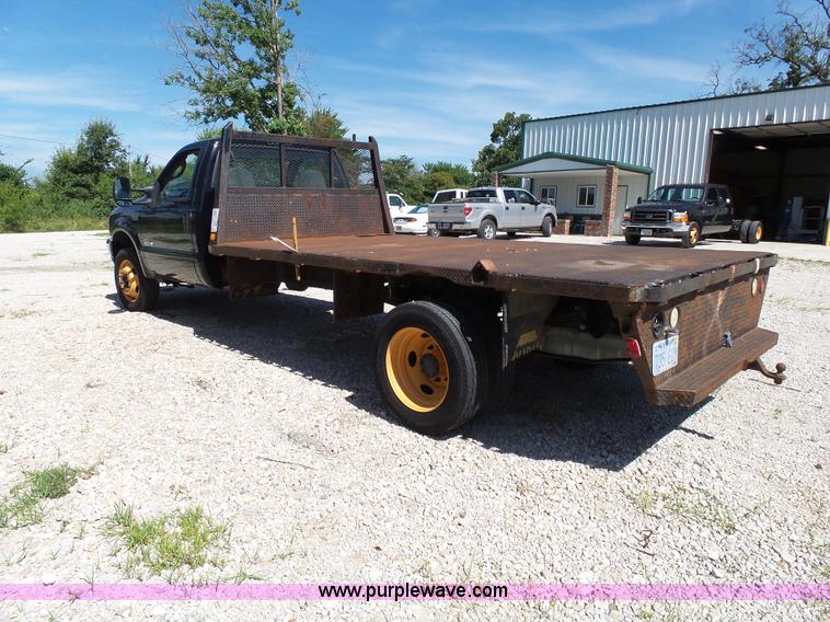 image for item K1192 2004 Ford F550 Crew Cab flatbed truck