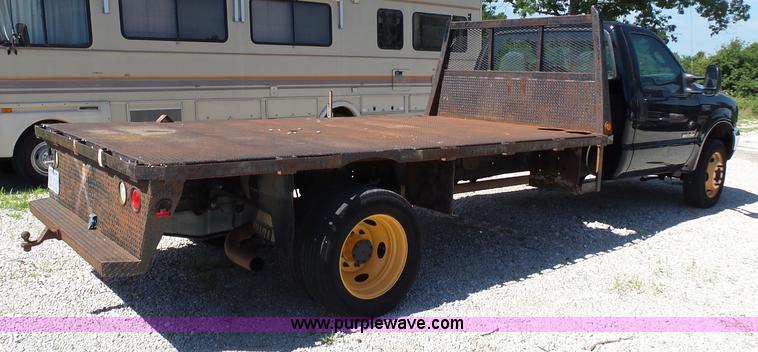 image for item K1192 2004 Ford F550 Crew Cab flatbed truck