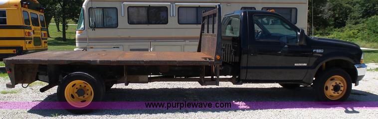 image for item K1192 2004 Ford F550 Crew Cab flatbed truck