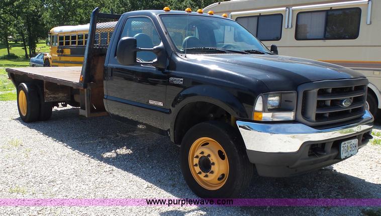 image for item K1192 2004 Ford F550 Crew Cab flatbed truck