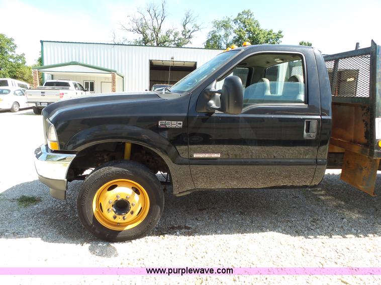 image for item K1192 2004 Ford F550 Crew Cab flatbed truck