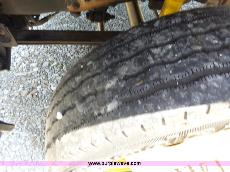 image for item K1192 2004 Ford F550 Crew Cab flatbed truck