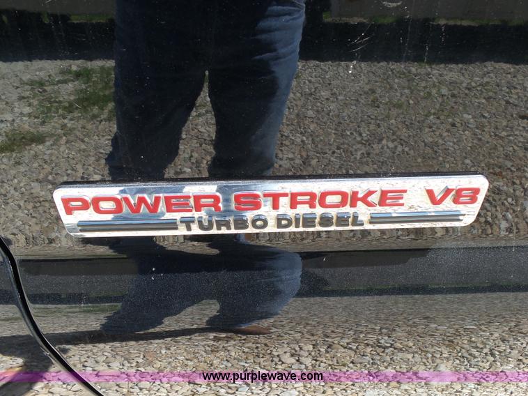 image for item K1192 2004 Ford F550 Crew Cab flatbed truck