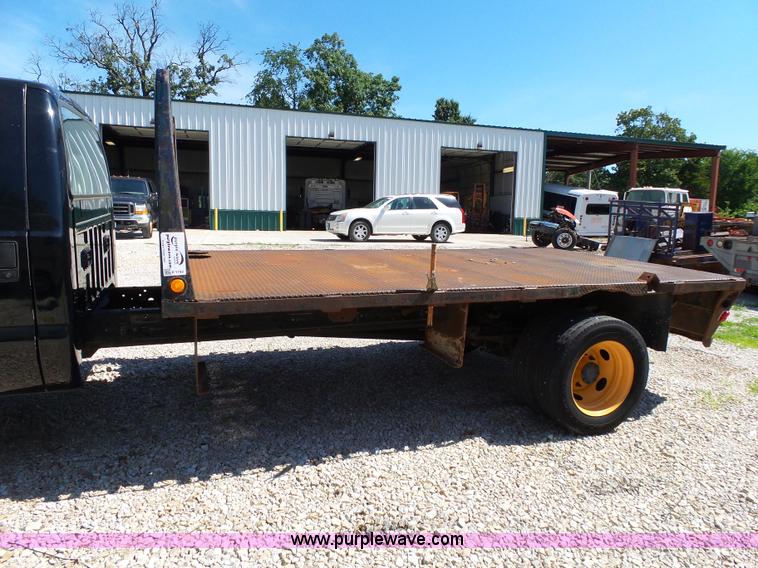 image for item K1192 2004 Ford F550 Crew Cab flatbed truck