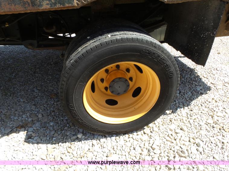 image for item K1192 2004 Ford F550 Crew Cab flatbed truck