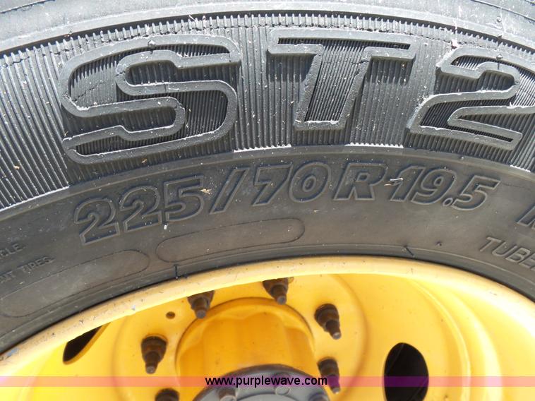 image for item K1192 2004 Ford F550 Crew Cab flatbed truck