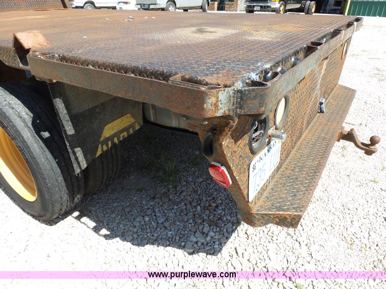 image for item K1192 2004 Ford F550 Crew Cab flatbed truck