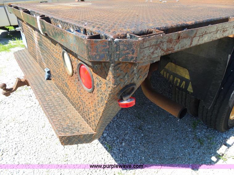 image for item K1192 2004 Ford F550 Crew Cab flatbed truck