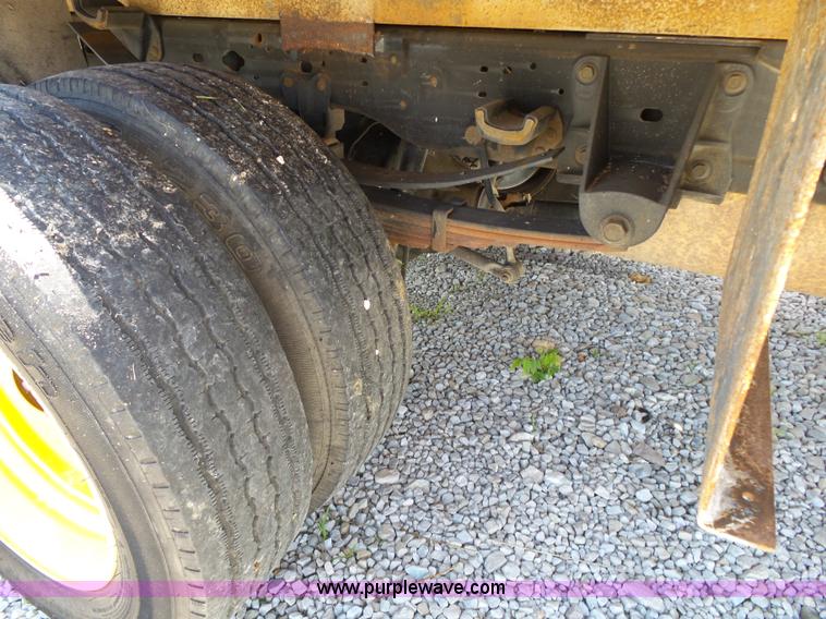 image for item K1192 2004 Ford F550 Crew Cab flatbed truck