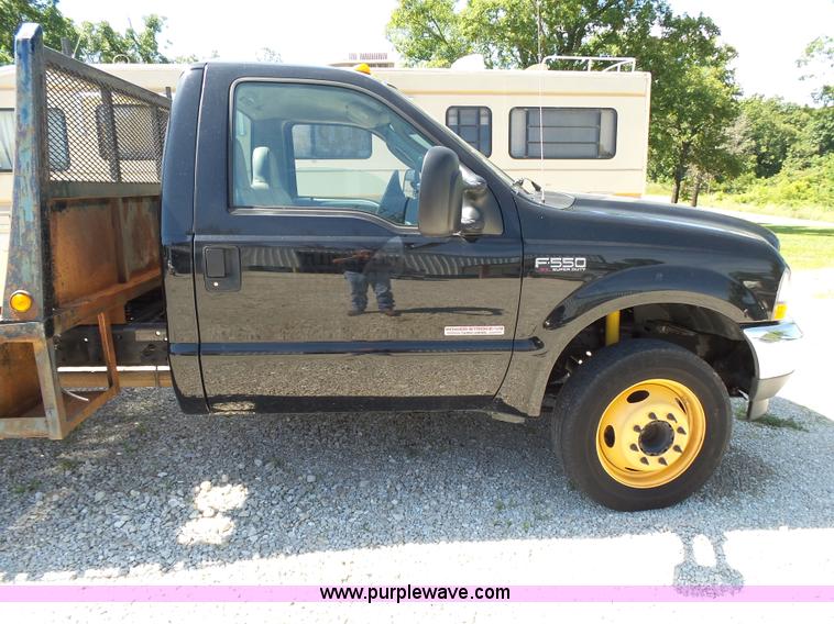 image for item K1192 2004 Ford F550 Crew Cab flatbed truck