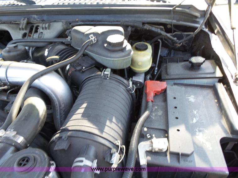 image for item K1192 2004 Ford F550 Crew Cab flatbed truck