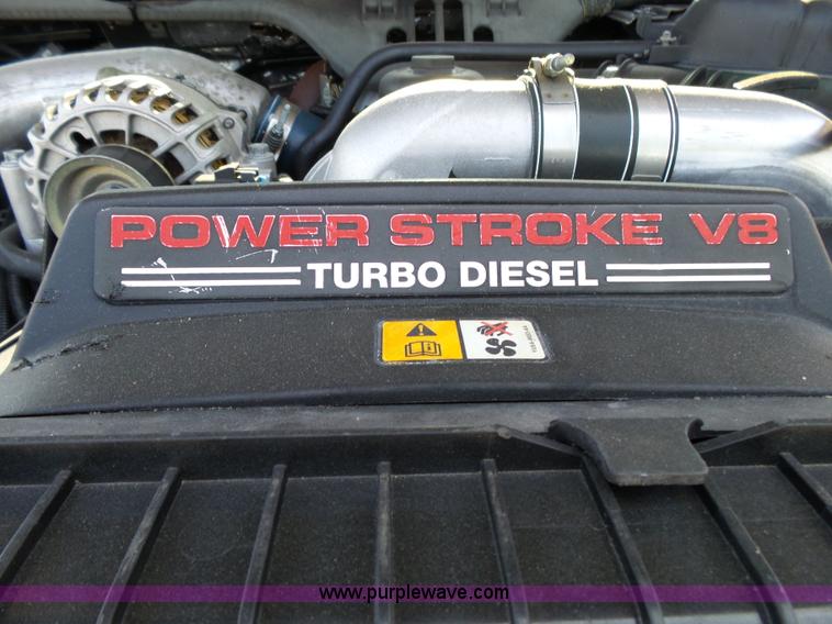 image for item K1192 2004 Ford F550 Crew Cab flatbed truck