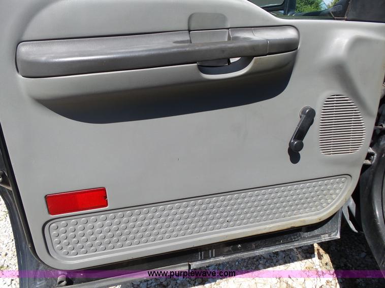 image for item K1192 2004 Ford F550 Crew Cab flatbed truck