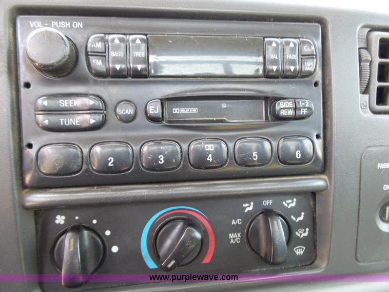 image for item K1192 2004 Ford F550 Crew Cab flatbed truck