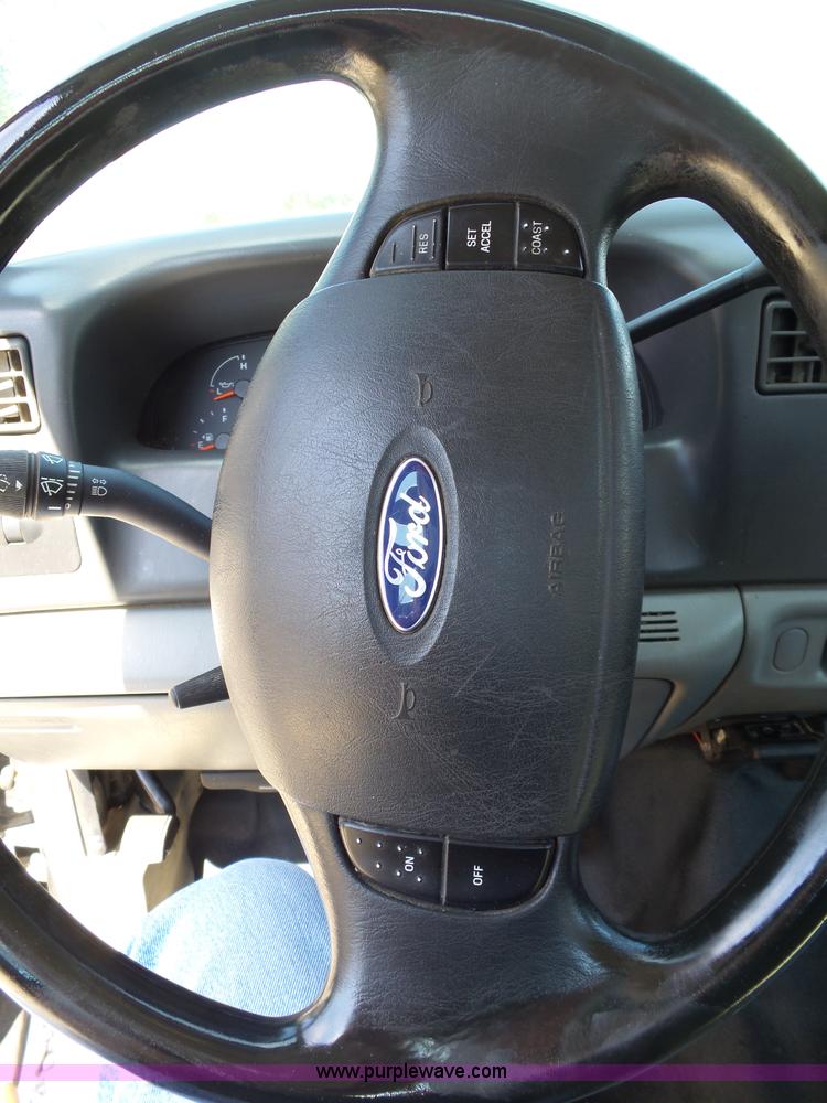 image for item K1192 2004 Ford F550 Crew Cab flatbed truck