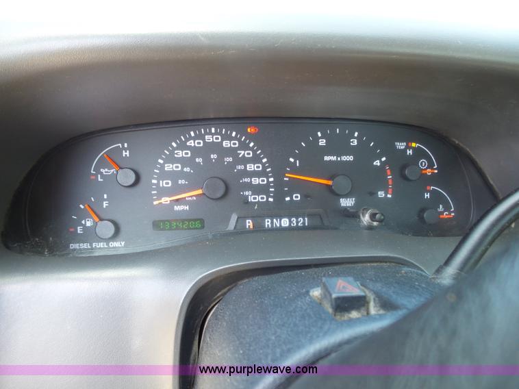 image for item K1192 2004 Ford F550 Crew Cab flatbed truck