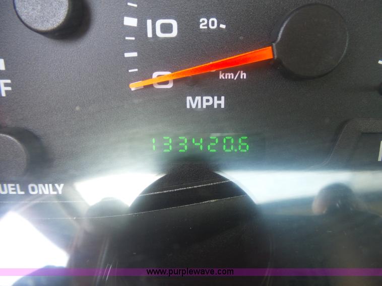 image for item K1192 2004 Ford F550 Crew Cab flatbed truck