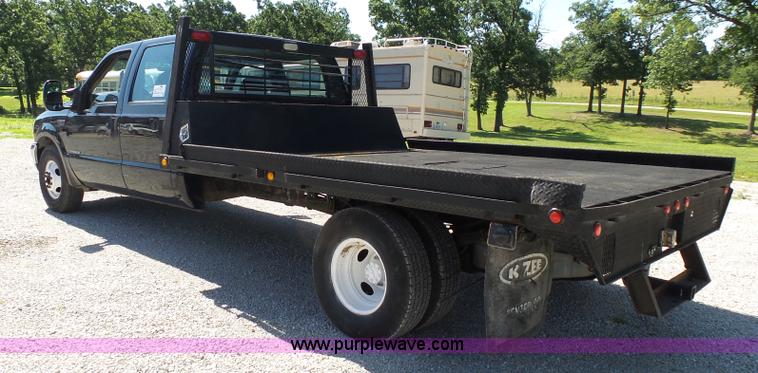 image for item K1193 2000 Ford F350 Super Duty Crew Cab flatbed pickup truck