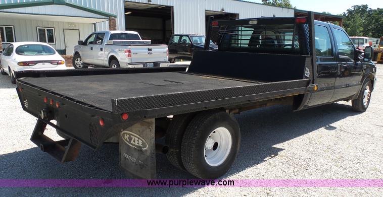 image for item K1193 2000 Ford F350 Super Duty Crew Cab flatbed pickup truck