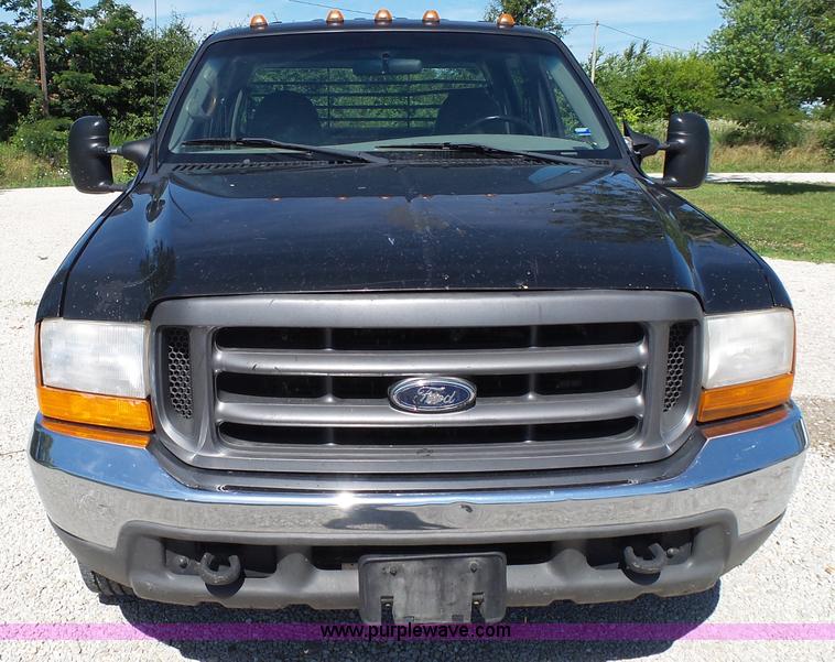 image for item K1193 2000 Ford F350 Super Duty Crew Cab flatbed pickup truck