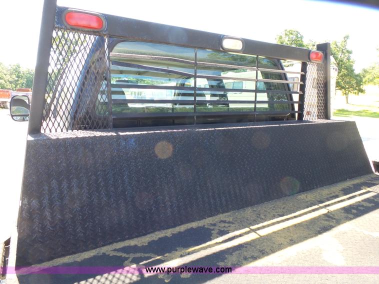 image for item K1193 2000 Ford F350 Super Duty Crew Cab flatbed pickup truck