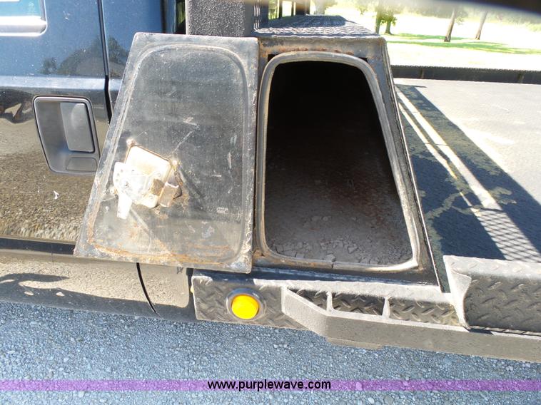 image for item K1193 2000 Ford F350 Super Duty Crew Cab flatbed pickup truck