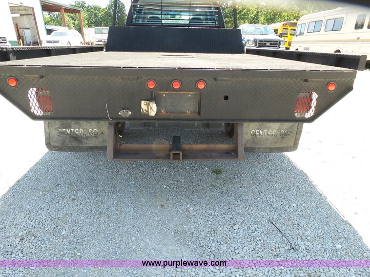 image for item K1193 2000 Ford F350 Super Duty Crew Cab flatbed pickup truck