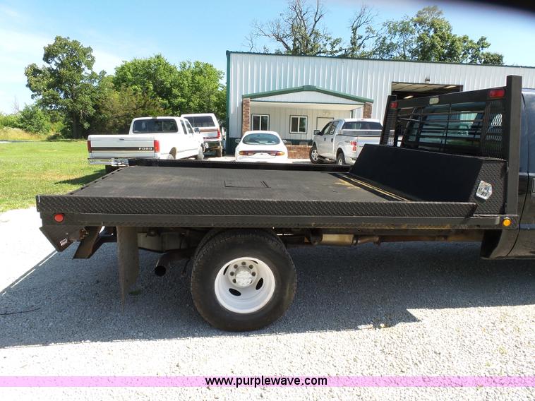 image for item K1193 2000 Ford F350 Super Duty Crew Cab flatbed pickup truck
