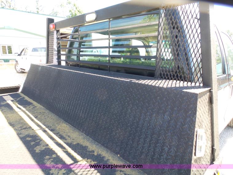 image for item K1193 2000 Ford F350 Super Duty Crew Cab flatbed pickup truck