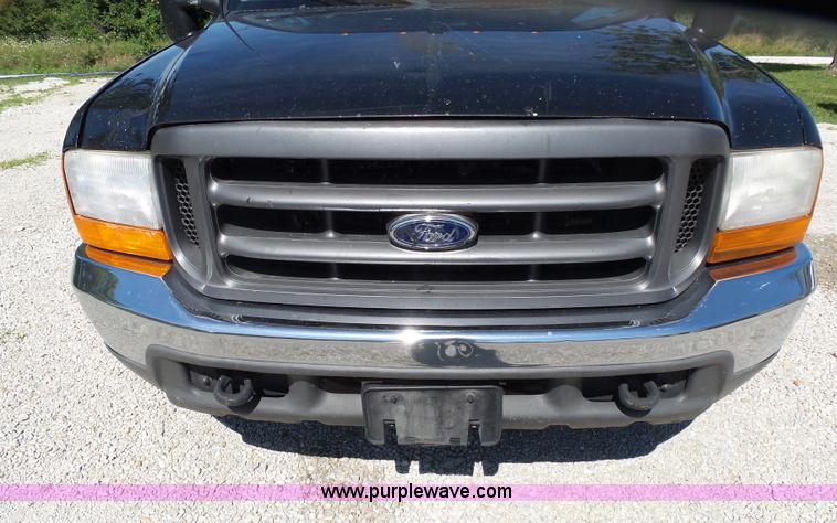 image for item K1193 2000 Ford F350 Super Duty Crew Cab flatbed pickup truck