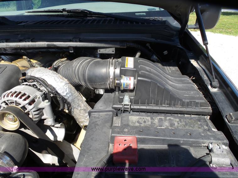 image for item K1193 2000 Ford F350 Super Duty Crew Cab flatbed pickup truck