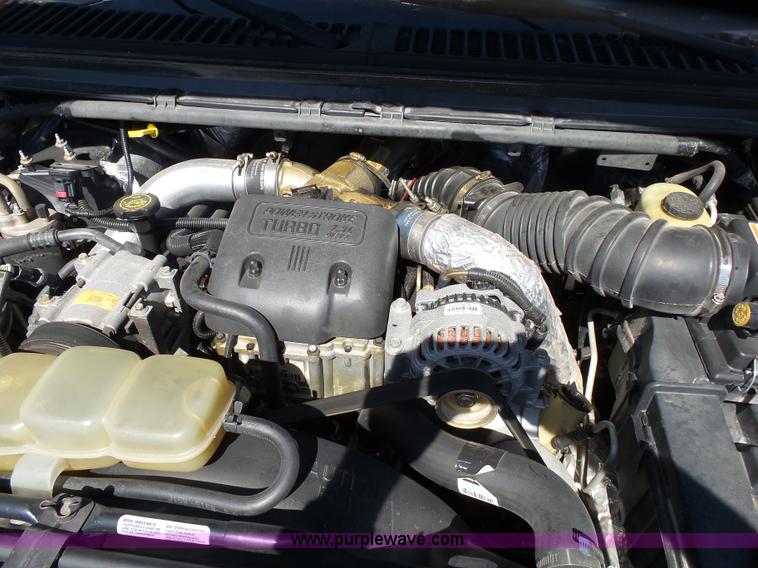 image for item K1193 2000 Ford F350 Super Duty Crew Cab flatbed pickup truck