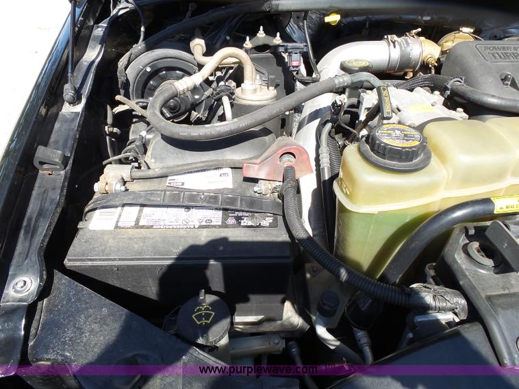 image for item K1193 2000 Ford F350 Super Duty Crew Cab flatbed pickup truck