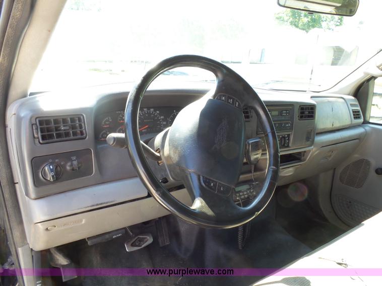 image for item K1193 2000 Ford F350 Super Duty Crew Cab flatbed pickup truck