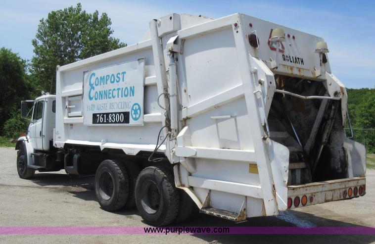 image for item L2824 1997 Freightliner FL80 refuse truck