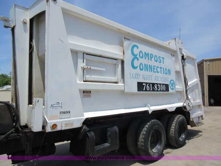 image for item L2824 1997 Freightliner FL80 refuse truck