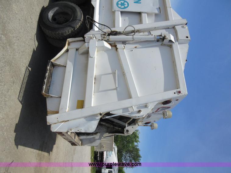 image for item L2824 1997 Freightliner FL80 refuse truck