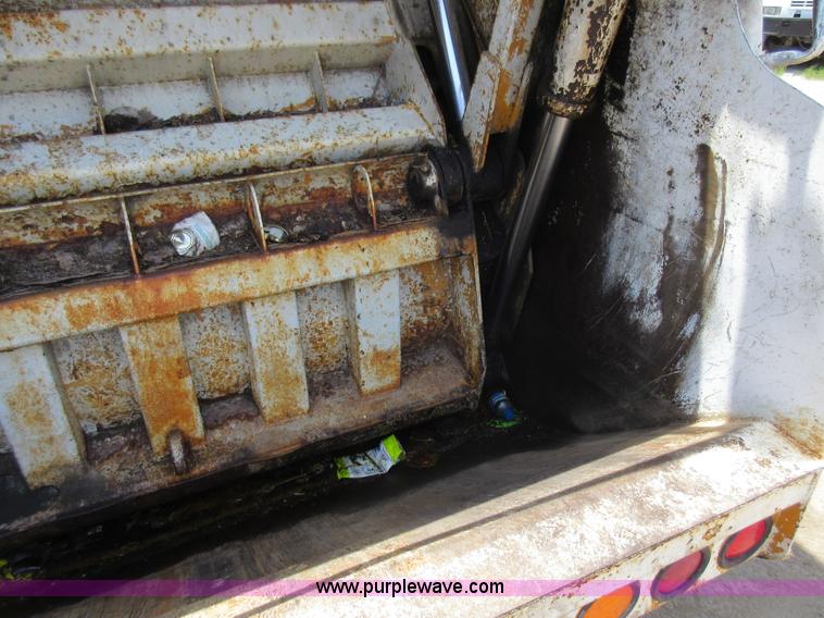 image for item L2824 1997 Freightliner FL80 refuse truck