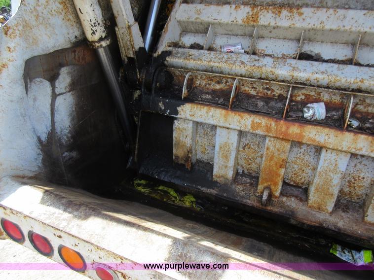 image for item L2824 1997 Freightliner FL80 refuse truck