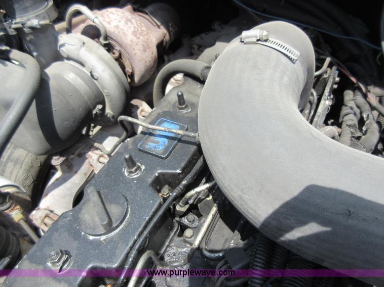 image for item L2824 1997 Freightliner FL80 refuse truck