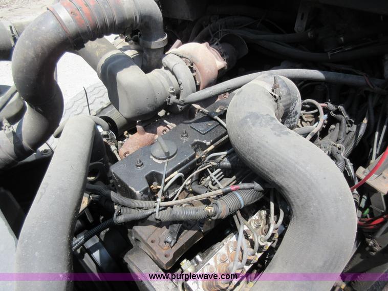 image for item L2825 1997 Freightliner FL80 refuse truck