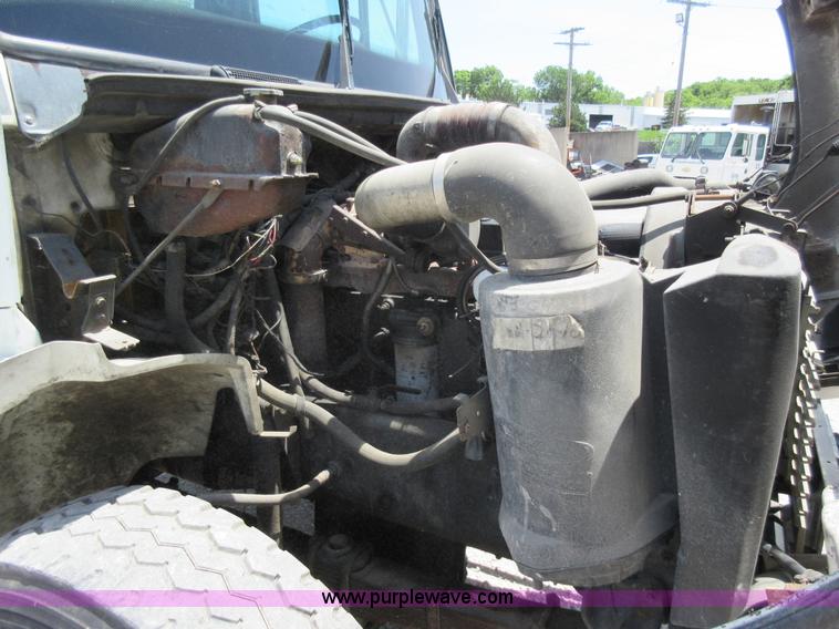 image for item L2825 1997 Freightliner FL80 refuse truck