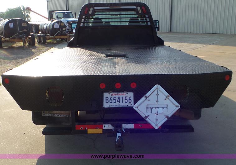 image for item L6749 2010 Ford 450 Super Duty flatbed truck