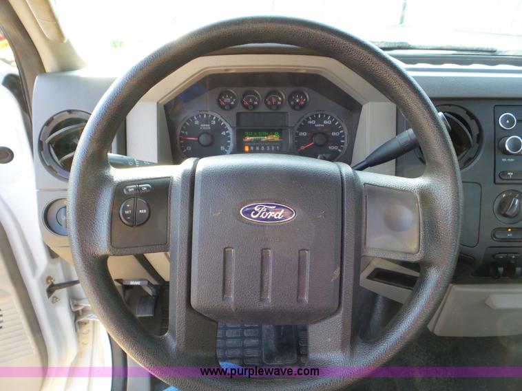 image for item L6749 2010 Ford 450 Super Duty flatbed truck