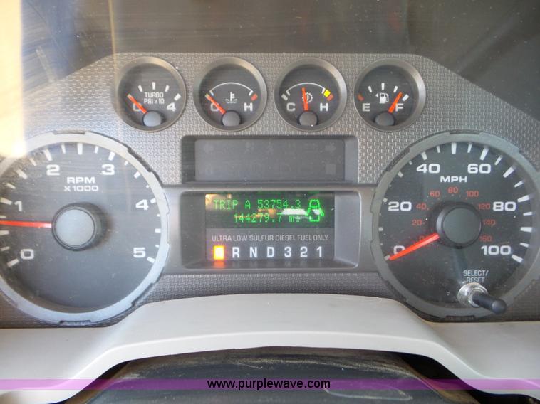 image for item L6749 2010 Ford 450 Super Duty flatbed truck