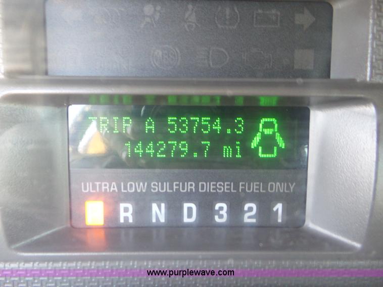 image for item L6749 2010 Ford 450 Super Duty flatbed truck