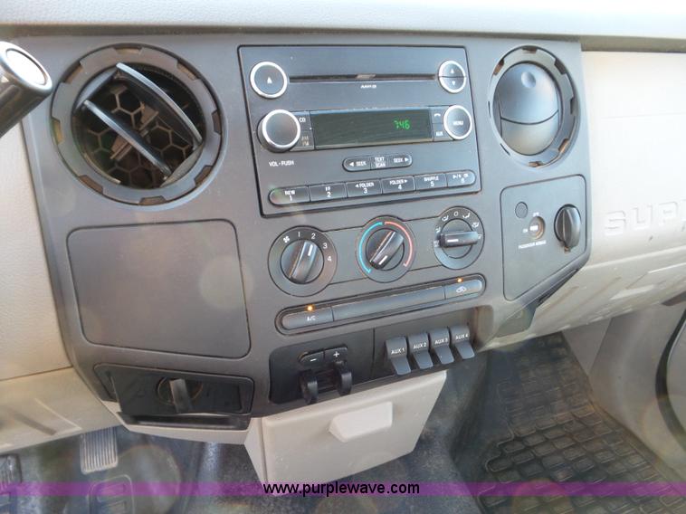 image for item L6749 2010 Ford 450 Super Duty flatbed truck