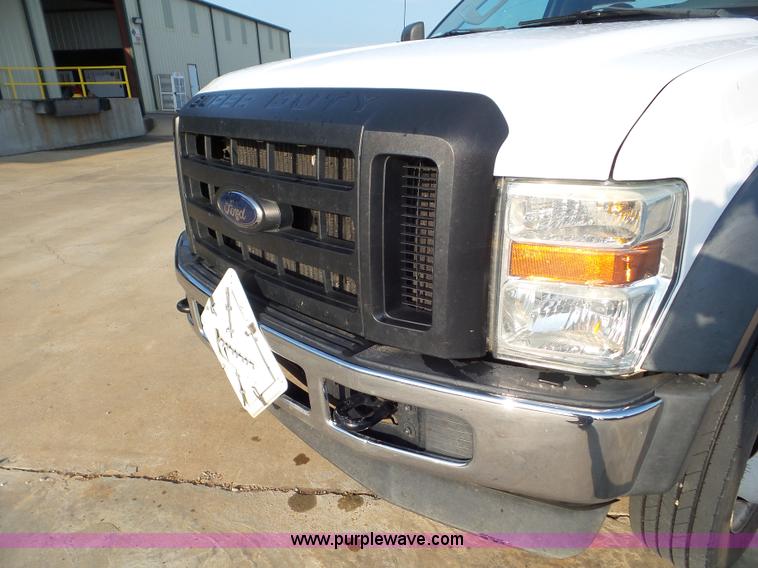 image for item L6749 2010 Ford 450 Super Duty flatbed truck