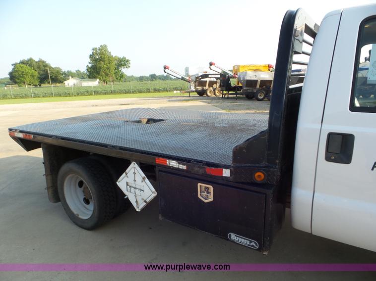 image for item L6749 2010 Ford 450 Super Duty flatbed truck