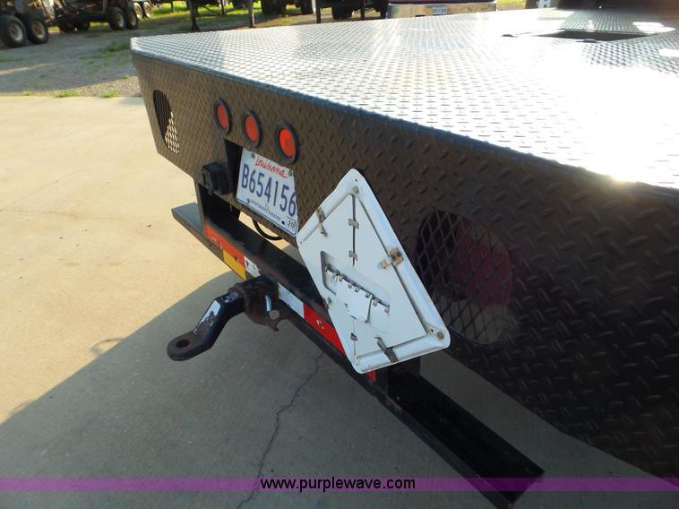 image for item L6749 2010 Ford 450 Super Duty flatbed truck